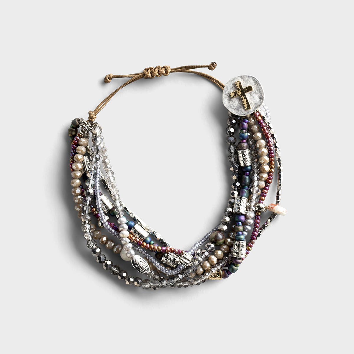 This handcrafted artisan bracelet encourages intentional living and quality time spent in prayer. Makes the perfect everyday piece, consisting of pearls, gemstones and glass beads. 