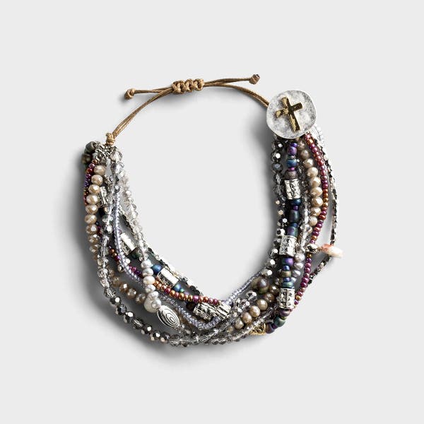 This handcrafted artisan bracelet encourages intentional living and quality time spent in prayer. Makes the perfect everyday piece, consisting of pearls, gemstones and glass beads. 