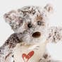 This mini plush giving bear is a perfect gift to encourage a friend or family member. The soft fabric of this taupe, stuffed teddy bear is soothing to the touch.